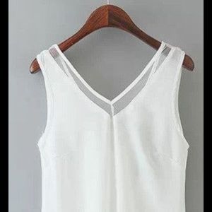 NWOT Sleeveless white top, sheer neck detail.