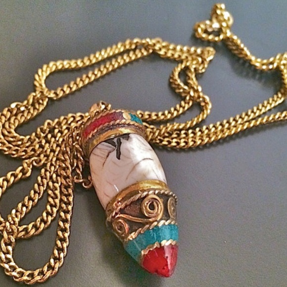 Bullet shaped horn pendant