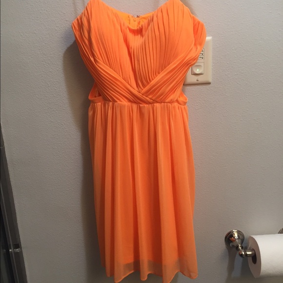 Orange dress with cut outs. - Picture 1 of 3