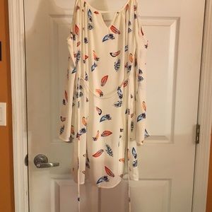 White dress with feathers