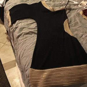 Off one shoulder black and gold dress