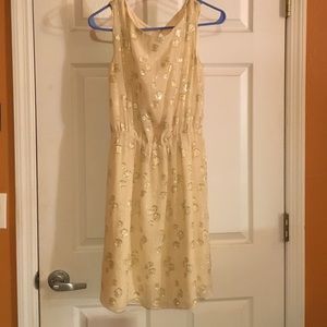 Cream dress with gold circles