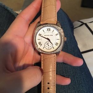 Lightly worn Michael Kors watch with leather strap
