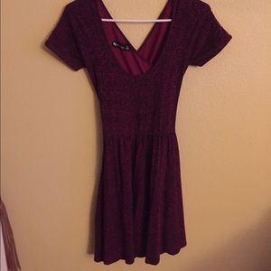 Little purple and black opened back dress