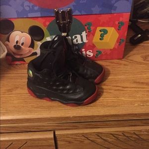 Size 8c toddler black and red Jordan's