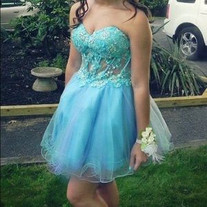 Strapless short formal dress.