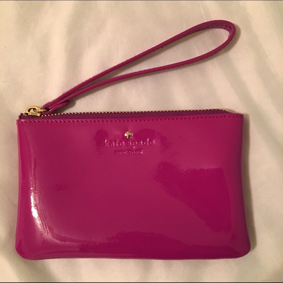 kate spade Handbags - KATE SPADE patent magenta wristlet