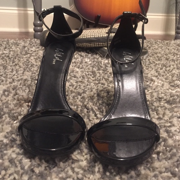 Strapped high heel shoes
