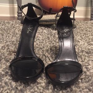 Strapped high heel shoes