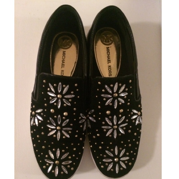 Authentic Michael Kors slip-on shoes. Super cute!