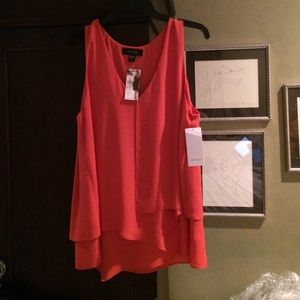 A orange Karen Kane large top