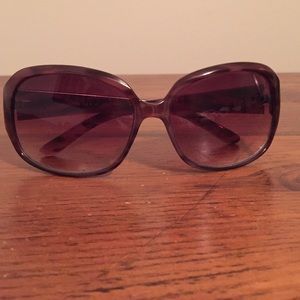 Purple tortoise shell sunglasses