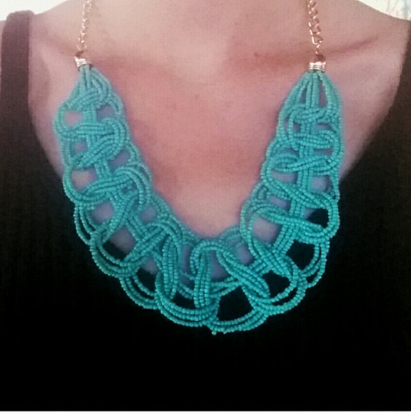 Turquoise and gold-colored statement necklace