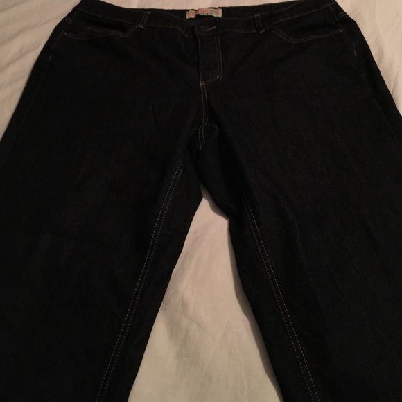 Black boot cut jeans with gold stitching