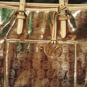 Micheal Kors Metalic Rose Gold Hand bag