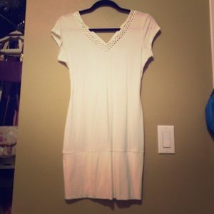 White body con dress with embellished neckline