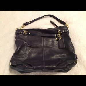 Coach eggplant color leather handbag