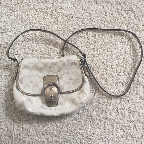Gold coach purse