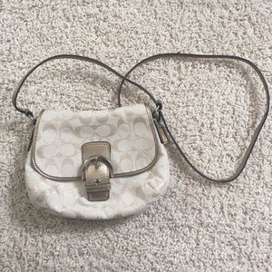 Gold coach purse