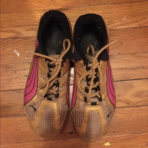 Puma pink and gold sneakers.
