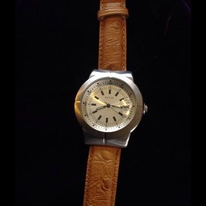Guess watch with leather band.
