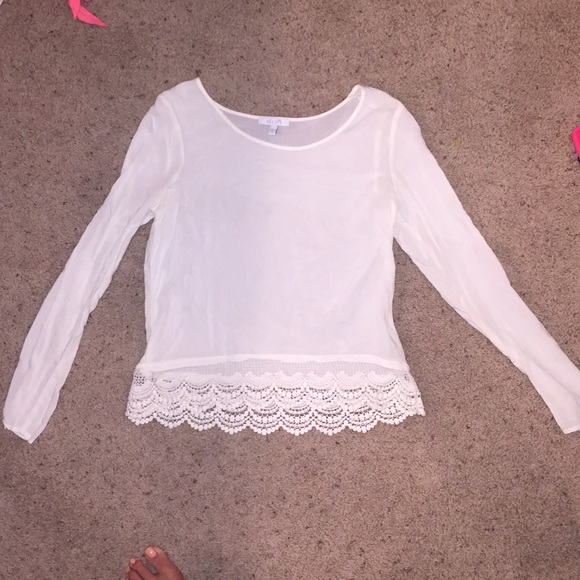 white long sleeve shirt w/ lace on bottom
