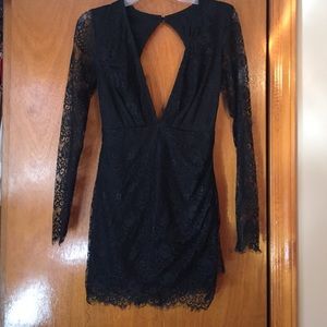 Black plunging mini dress