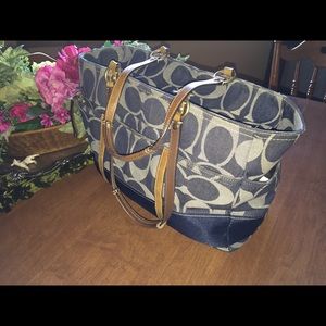 Coach signature diaper bag or large tote/satchel.