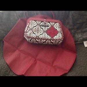 Small diaper bag with snap-in changing pad