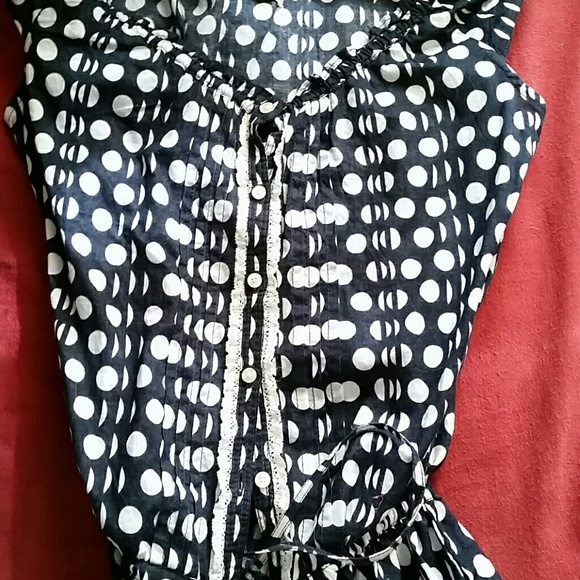 Sleeveless button down