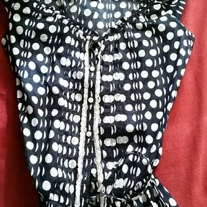 Sleeveless button down