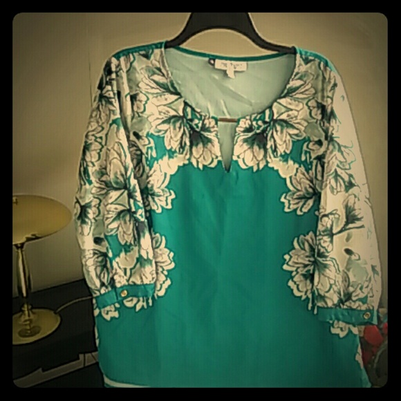 Light weight, gold accented blouse.