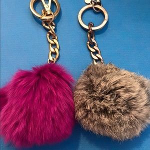 2 MK fur ball key chains (defective)