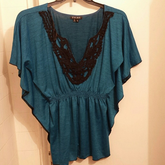 Winged blue dress shirt