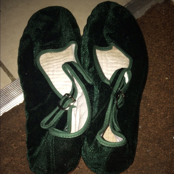 Green velvet Mary Janes.