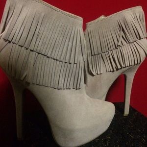 New tan fringe short boots.