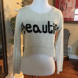 Papaya crop top sweater says "#Beautiful"