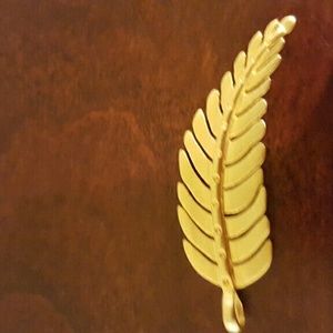 Gold stella and dot festher charm