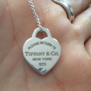 Silver Tiffany's necklace.