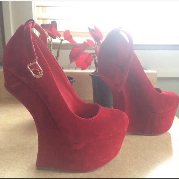 Red high heeled heelless shoes