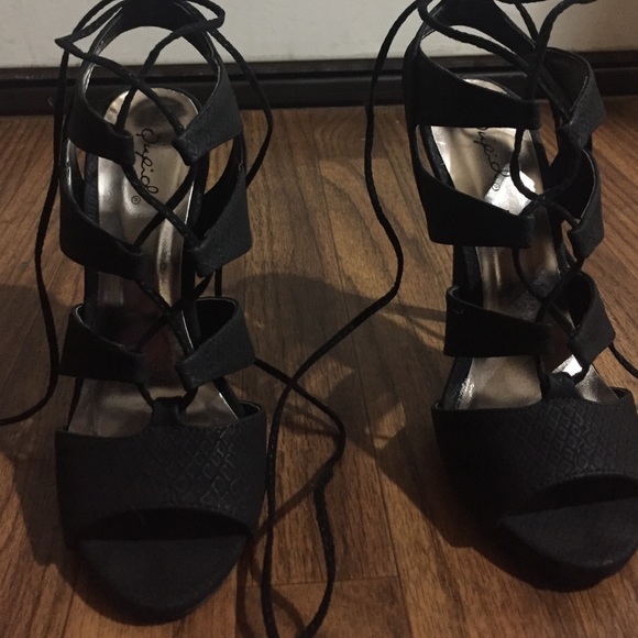 Black strapped heels