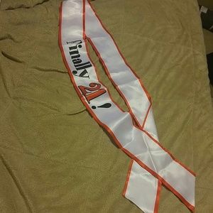 Silk sash that says"Finally 21"