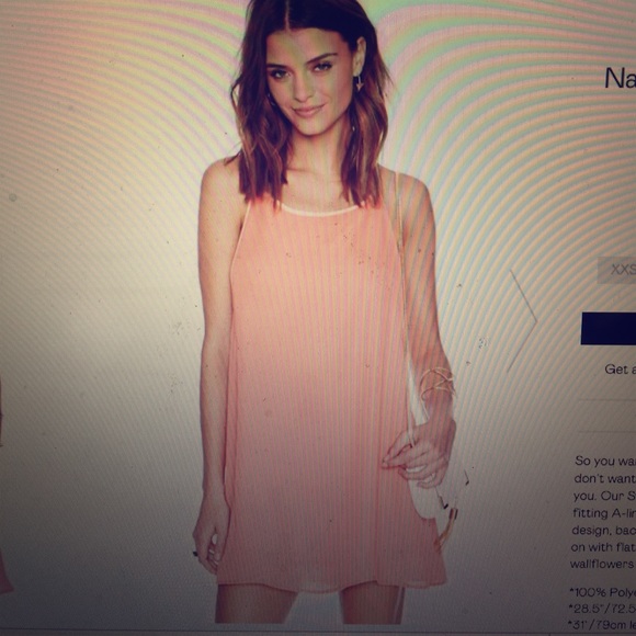 Breezy summer dress in peach. Never been worn