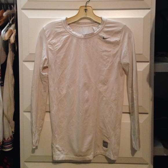A white NIKE long sleeved t-shirt
