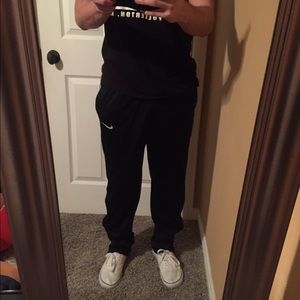 ALL BLACK NIKE TRACK SWEATS
