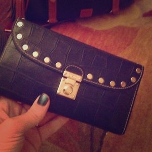 beautiful black checkbook wallet. dooney & bourke.