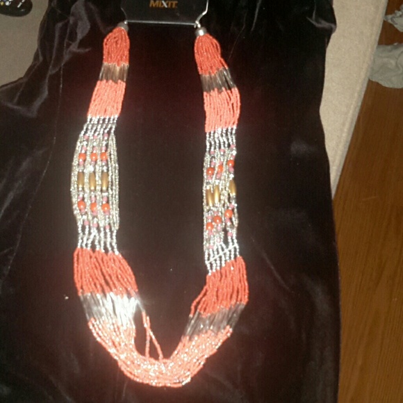 Beautiful  Silver w/ peach/orange beads