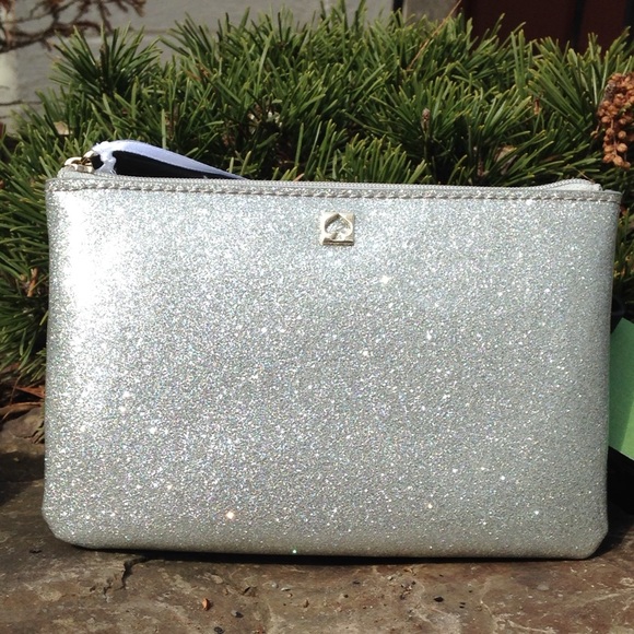 kate spade Handbags - Kate Spade silver glitter wristlet NWT
