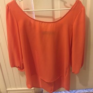 Orange blouse with bow on back. Offers and trades!