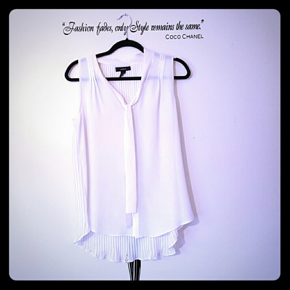 White sleeveless sheer blouse